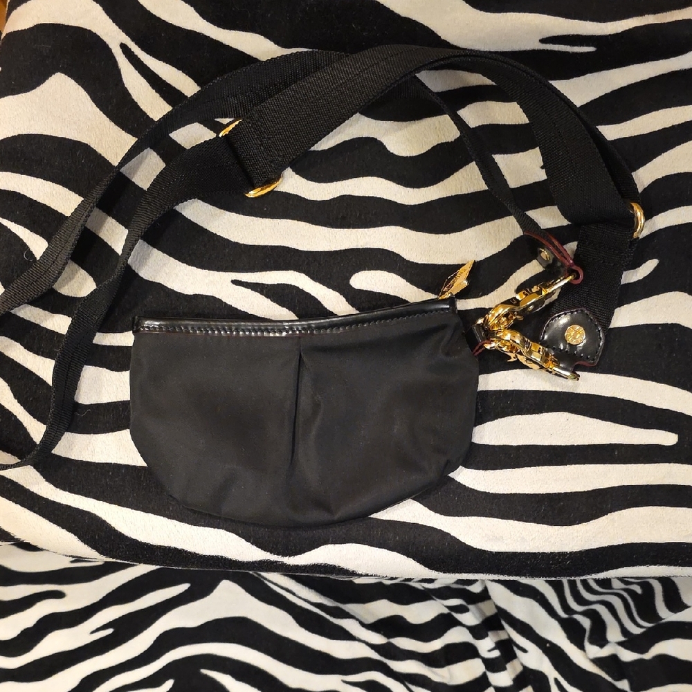 Elegant Black Crossbody Bag with Gold Accents